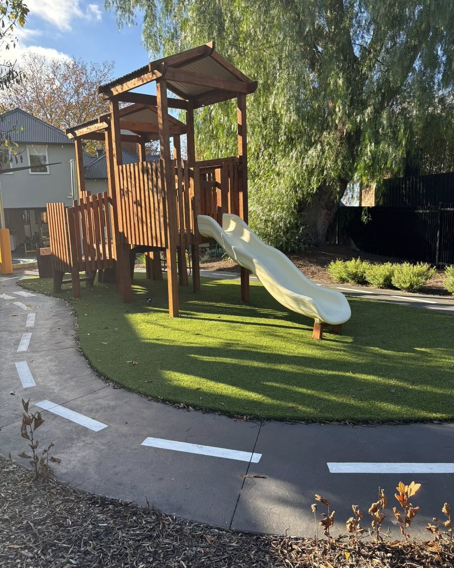 The timber fort and slide beside the bike track